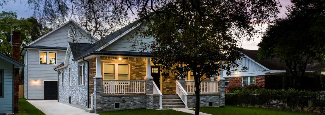 Auxillary dwelling unit above two-car garage in view from driveway