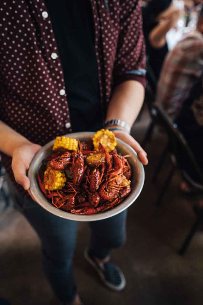 Crawfish boil entree with corn on the cob