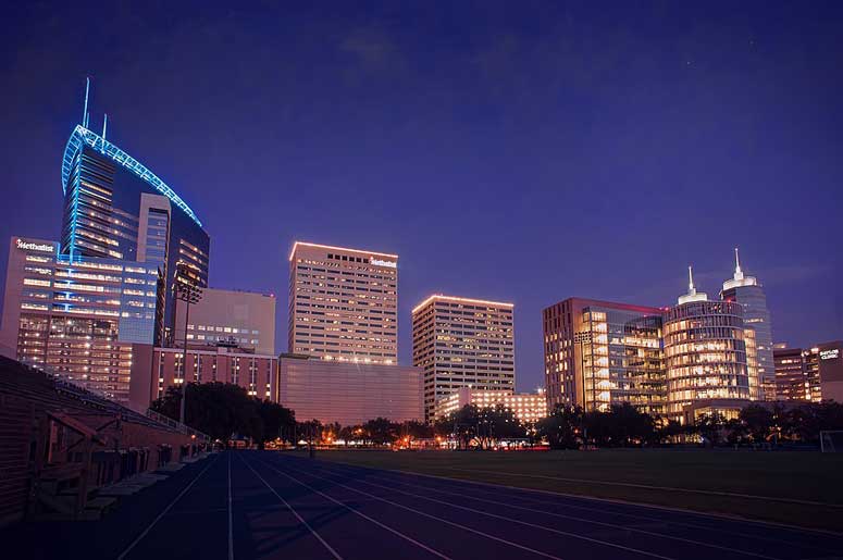 Texas Medical Center complex of buildings at nighttime. It is the largest medical city in the world.
